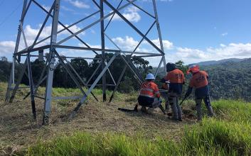 Project team at transmission tower