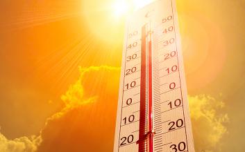 Thermometer with orange sky