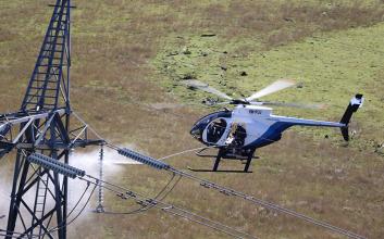 Aeropower helicopter doing insulator washing
