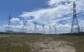Transmission towers in field