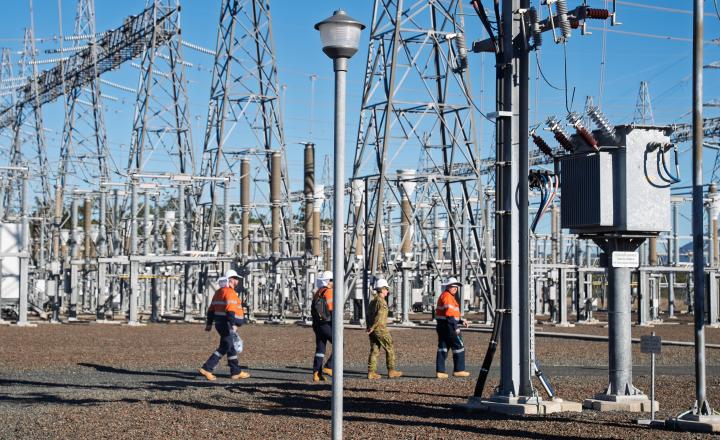 people walking in substation