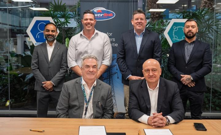 a group of people with contracts