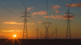 Transmission towers at sunset