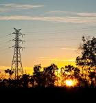 Transmission tower at sunset